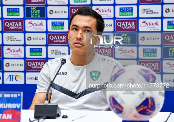 Uzbekistan player Otabek Shukurov attends a press conference at Jassim Bin Hamad Stadium in Doha, Qatar, on November 13, 2024, ahead of the...