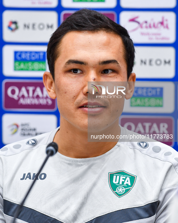 Uzbekistan player Otabek Shukurov attends a press conference at Jassim Bin Hamad Stadium in Doha, Qatar, on November 13, 2024, ahead of the...