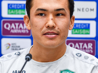 Uzbekistan player Otabek Shukurov attends a press conference at Jassim Bin Hamad Stadium in Doha, Qatar, on November 13, 2024, ahead of the...