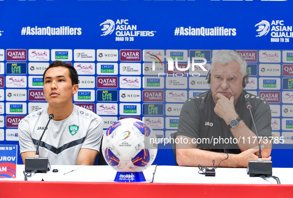 Uzbekistan national team assistant coach Vlado Radmanovich (R) and player Otabek Shukurov (L) attend a press conference at Jassim Bin Hamad...