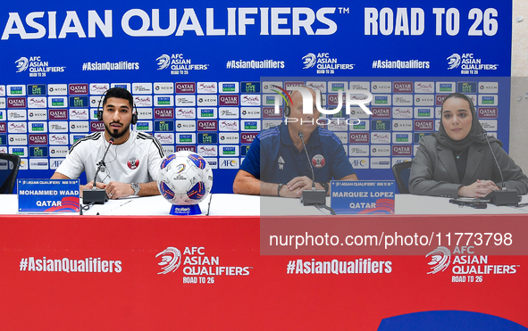 Qatar national team head coach Marquez Lopez (second from right) and player Mohammed Waad (left) attend a press conference at Jassim Bin Ham...