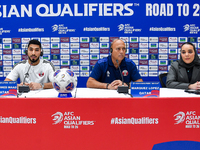 Qatar national team head coach Marquez Lopez (second from right) and player Mohammed Waad (left) attend a press conference at Jassim Bin Ham...