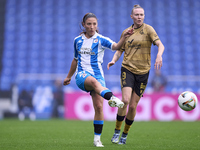 Lucia Martinez Gonzalez of RC Deportivo Abanca is challenged by Sanni Franssi of Real Sociedad during the Liga F match between RC Deportivo...