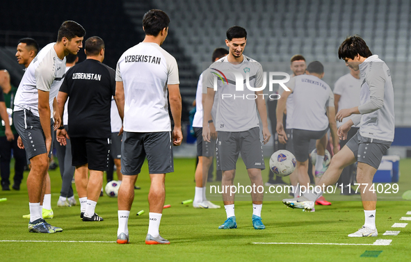 Players of the Uzbekistan national team train at Jassim Bin Hamad Stadium in Doha, Qatar, on November 13, 2024, ahead of the FIFA World Cup...