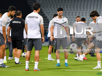 Players of the Uzbekistan national team train at Jassim Bin Hamad Stadium in Doha, Qatar, on November 13, 2024, ahead of the FIFA World Cup...