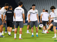 Players of the Uzbekistan national team train at Jassim Bin Hamad Stadium in Doha, Qatar, on November 13, 2024, ahead of the FIFA World Cup...