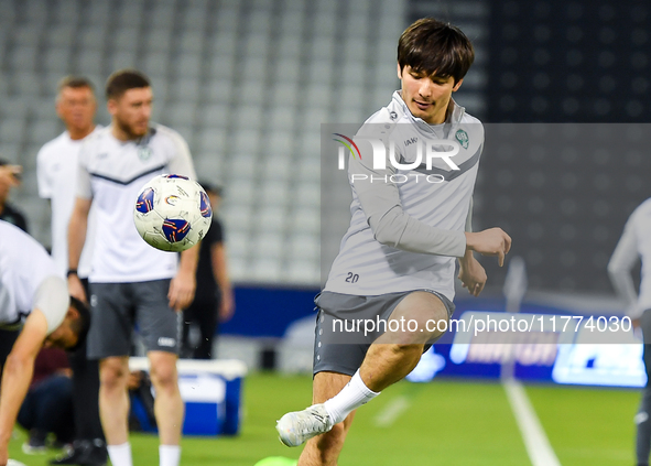 Hojimat Erkinov from the Uzbekistan National football team attends a training session at Jassim Bin Hamad Stadium in Doha, Qatar, on Novembe...