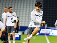 Hojimat Erkinov from the Uzbekistan National football team attends a training session at Jassim Bin Hamad Stadium in Doha, Qatar, on Novembe...