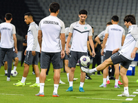 Players of the Uzbekistan national team train at Jassim Bin Hamad Stadium in Doha, Qatar, on November 13, 2024, ahead of the FIFA World Cup...