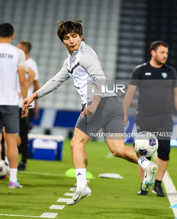 Hojimat Erkinov from the Uzbekistan National football team attends a training session at Jassim Bin Hamad Stadium in Doha, Qatar, on Novembe...