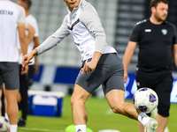 Hojimat Erkinov from the Uzbekistan National football team attends a training session at Jassim Bin Hamad Stadium in Doha, Qatar, on Novembe...