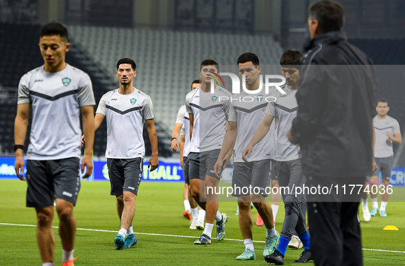 Players of the Uzbekistan national team train at Jassim Bin Hamad Stadium in Doha, Qatar, on November 13, 2024, ahead of the FIFA World Cup...