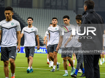 Players of the Uzbekistan national team train at Jassim Bin Hamad Stadium in Doha, Qatar, on November 13, 2024, ahead of the FIFA World Cup...