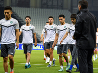 Players of the Uzbekistan national team train at Jassim Bin Hamad Stadium in Doha, Qatar, on November 13, 2024, ahead of the FIFA World Cup...