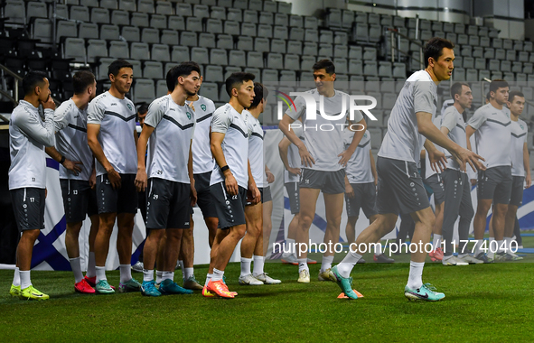 Players of the Uzbekistan national team train at Jassim Bin Hamad Stadium in Doha, Qatar, on November 13, 2024, ahead of the FIFA World Cup...