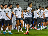 Players of the Uzbekistan national team train at Jassim Bin Hamad Stadium in Doha, Qatar, on November 13, 2024, ahead of the FIFA World Cup...