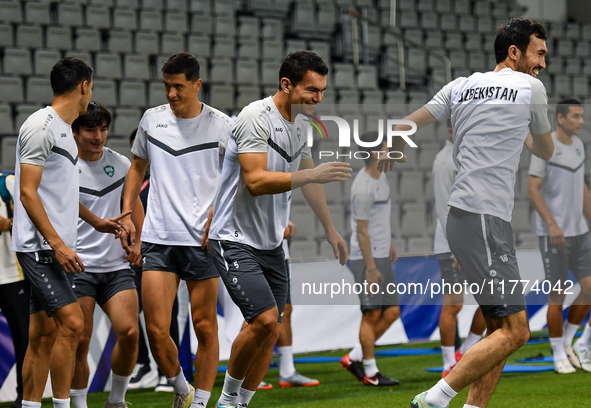 Players of the Uzbekistan national team train at Jassim Bin Hamad Stadium in Doha, Qatar, on November 13, 2024, ahead of the FIFA World Cup...