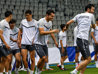 Players of the Uzbekistan national team train at Jassim Bin Hamad Stadium in Doha, Qatar, on November 13, 2024, ahead of the FIFA World Cup...