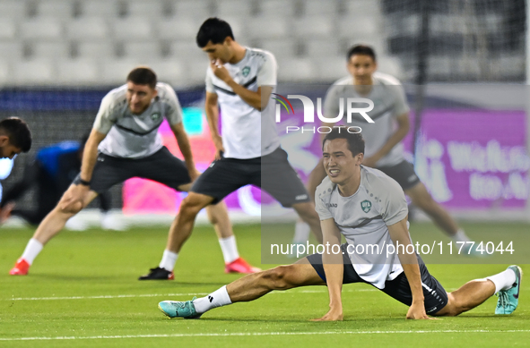 Players of the Uzbekistan national team train at Jassim Bin Hamad Stadium in Doha, Qatar, on November 13, 2024, ahead of the FIFA World Cup...