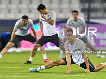 Players of the Uzbekistan national team train at Jassim Bin Hamad Stadium in Doha, Qatar, on November 13, 2024, ahead of the FIFA World Cup...