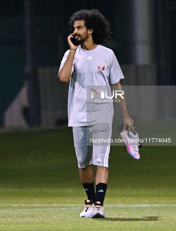 Akram Afif from the Qatar National football team attends a training session at Aspire Academy in Doha, Qatar, on November 13, 2024, ahead of...