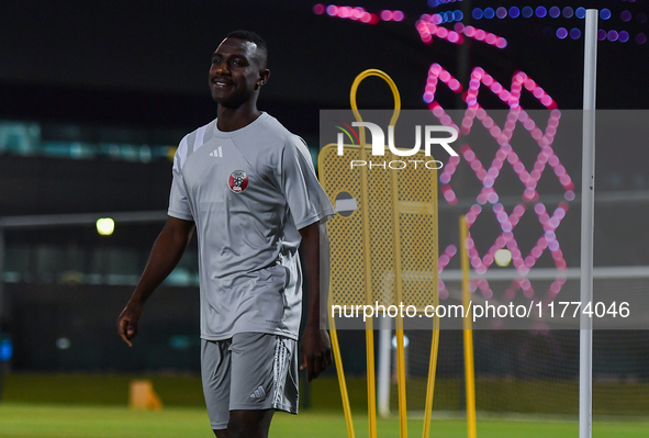 Almoez Ali from the Qatar National football team attends a training session at Aspire Academy in Doha, Qatar, on November 13, 2024, ahead of...