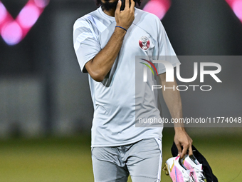 Akram Afif from the Qatar National football team attends a training session at Aspire Academy in Doha, Qatar, on November 13, 2024, ahead of...