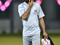 Akram Afif from the Qatar National football team attends a training session at Aspire Academy in Doha, Qatar, on November 13, 2024, ahead of...