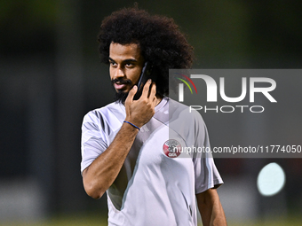 Akram Afif from the Qatar National football team attends a training session at Aspire Academy in Doha, Qatar, on November 13, 2024, ahead of...