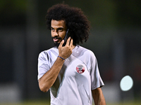 Akram Afif from the Qatar National football team attends a training session at Aspire Academy in Doha, Qatar, on November 13, 2024, ahead of...