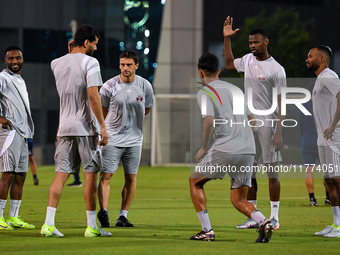 Players of the Qatar national team train at Aspire Academy in Doha, Qatar, on November 13, 2024, ahead of the FIFA World Cup 2026 Qualificat...