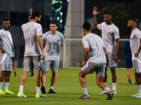 Players of the Qatar national team train at Aspire Academy in Doha, Qatar, on November 13, 2024, ahead of the FIFA World Cup 2026 Qualificat...