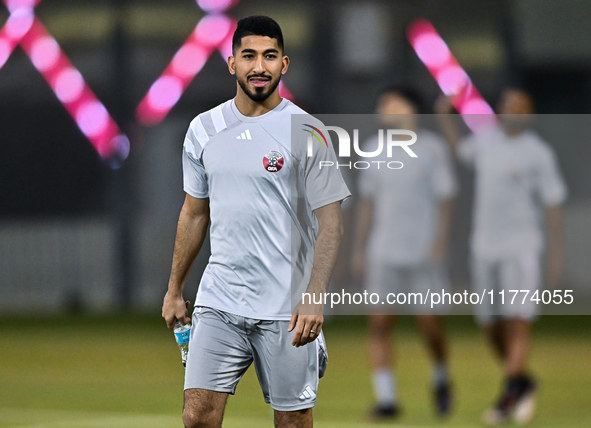 Mohammed Waad from the Qatar National football team attends a training session at Aspire Academy in Doha, Qatar, on November 13, 2024, ahead...