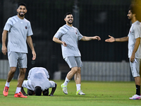 Players of the Qatar national team train at Aspire Academy in Doha, Qatar, on November 13, 2024, ahead of the FIFA World Cup 2026 Qualificat...