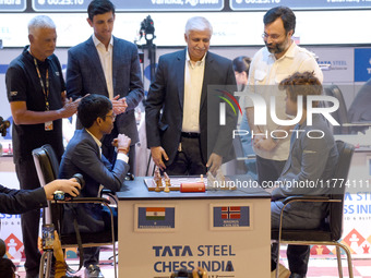 Chess players Rameshbabu Praggnanandhaa of India and Magnus Carlsen of Norway, a five-time World Chess Champion, compete on the first day of...