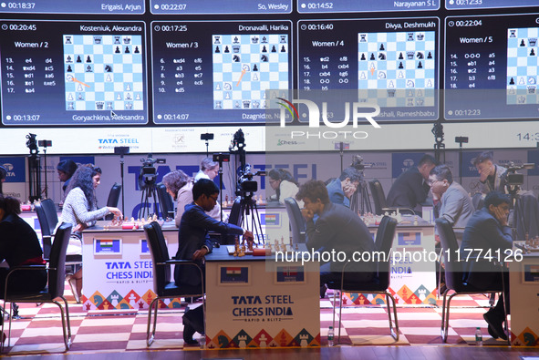 Chess players Rameshbabu Praggnanandhaa of India and Magnus Carlsen of Norway, a five-time World Chess Champion, compete on the first day of...