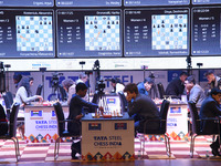 Chess players Rameshbabu Praggnanandhaa of India and Magnus Carlsen of Norway, a five-time World Chess Champion, compete on the first day of...