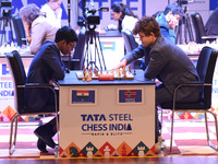 Chess players Rameshbabu Praggnanandhaa of India and Magnus Carlsen of Norway, a five-time World Chess Champion, compete on the first day of...