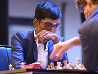 Chess player Rameshbabu Praggnanandhaa of India competes against Norway's Magnus Carlsen, five-time World Chess Champion, on the first day o...