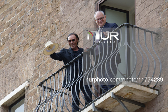 Antonello Venditti and Roberto Gualtieri look out from the balcony of the Campidoglio in Rome, Italy, on November 13, 2024. 