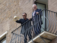 Antonello Venditti and Roberto Gualtieri look out from the balcony of the Campidoglio in Rome, Italy, on November 13, 2024. (