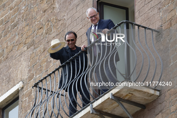 Antonello Venditti and Roberto Gualtieri look out from the balcony of the Campidoglio in Rome, Italy, on November 13, 2024. 