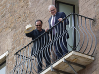 Antonello Venditti and Roberto Gualtieri look out from the balcony of the Campidoglio in Rome, Italy, on November 13, 2024. (