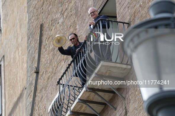 Antonello Venditti and Roberto Gualtieri look out from the balcony of the Campidoglio in Rome, Italy, on November 13, 2024. 