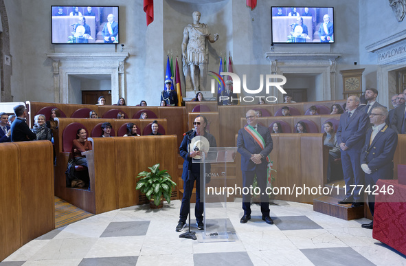 Italian singer-songwriter Antonello Venditti and Mayor of Rome Roberto Gualtieri attend the Capitoline Wolf award ceremony inside the Giulio...