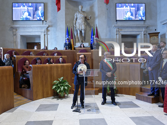 Italian singer-songwriter Antonello Venditti and Mayor of Rome Roberto Gualtieri attend the Capitoline Wolf award ceremony inside the Giulio...