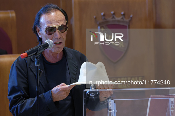 Italian singer-songwriter Antonello Venditti and Mayor of Rome Roberto Gualtieri attend the Capitoline Wolf award ceremony inside the Giulio...