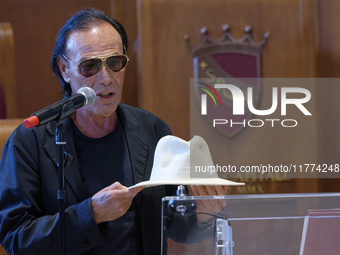 Italian singer-songwriter Antonello Venditti and Mayor of Rome Roberto Gualtieri attend the Capitoline Wolf award ceremony inside the Giulio...