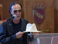 Italian singer-songwriter Antonello Venditti and Mayor of Rome Roberto Gualtieri attend the Capitoline Wolf award ceremony inside the Giulio...