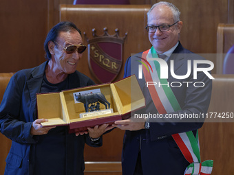 Italian singer-songwriter Antonello Venditti attends the Capitoline Wolf award ceremony inside the Giulio Cesare Hall at the Campidoglio in...